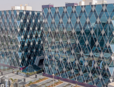 Aerial view of a modern urban development in New Cairo, Egypt, representing the growth of tech startup hubs and real estate demand corridors.
